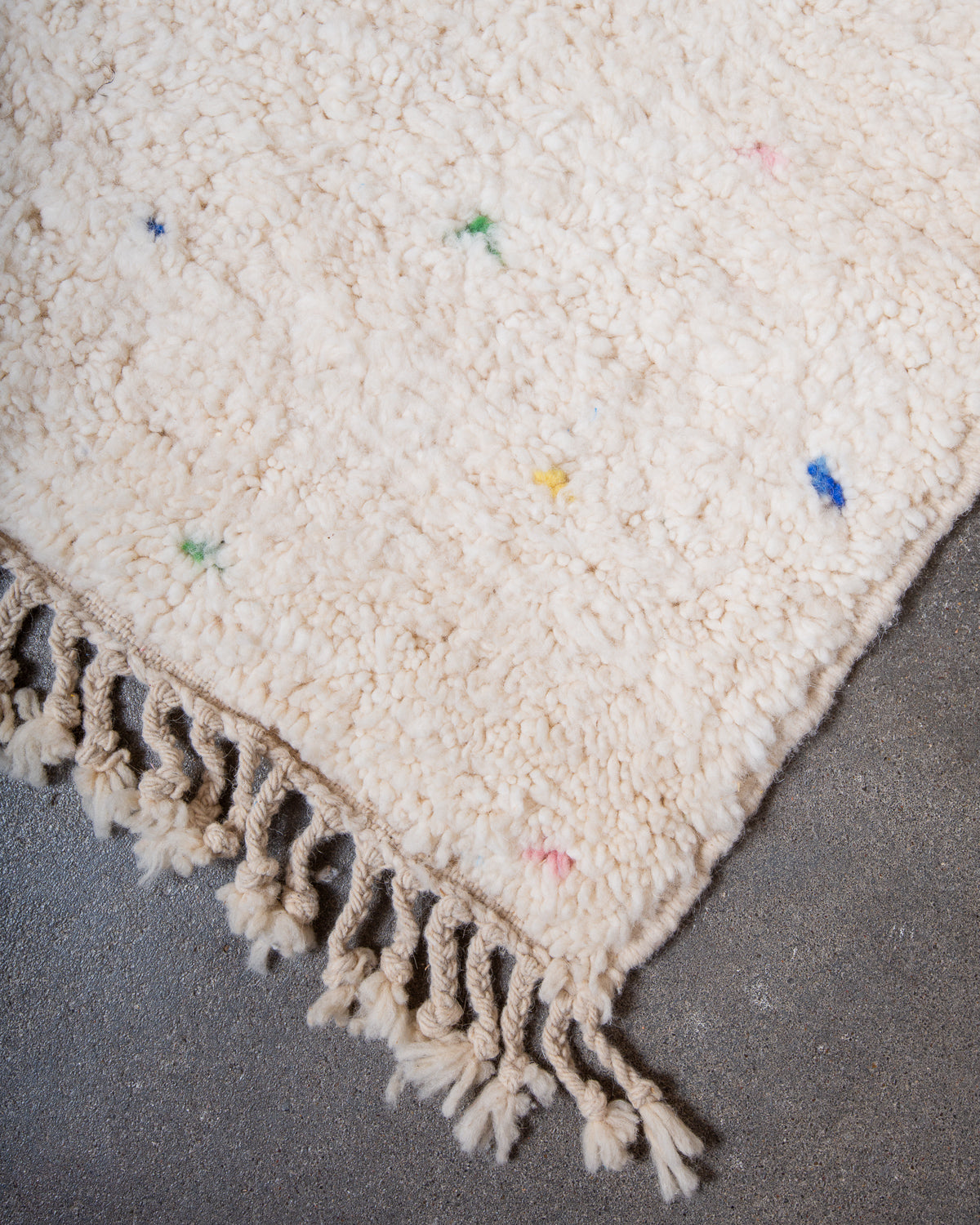 Modern, designer, handcrafted Berber rug from Morocco. Beniourain carpet with beautiful colours and patterns and fluffy wool texture.